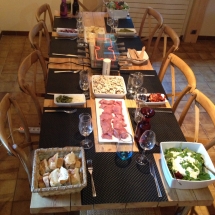 Dining table set for a raclette supper